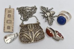 A SMALL ASSORTMENT OF SILVER AND WHITE METAL JEWELLERY, to include a silver ingot pendant,