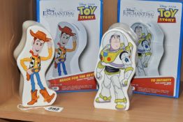 TWO BOXED ENESCO DISNEY ENCHANTING COLLECTION 'TOY STORY' MONEY BANKS, comprising 'Reach for the