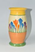 A CLARICE CLIFF 'CROCUS' PATTERN VASE, the footed vase painted with orange, purple and blue