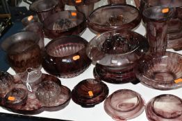 A QUANTITY OF PURPLE RICHARDSONS CLOUD GLASS WARES, to include a pair of vases, approximate height