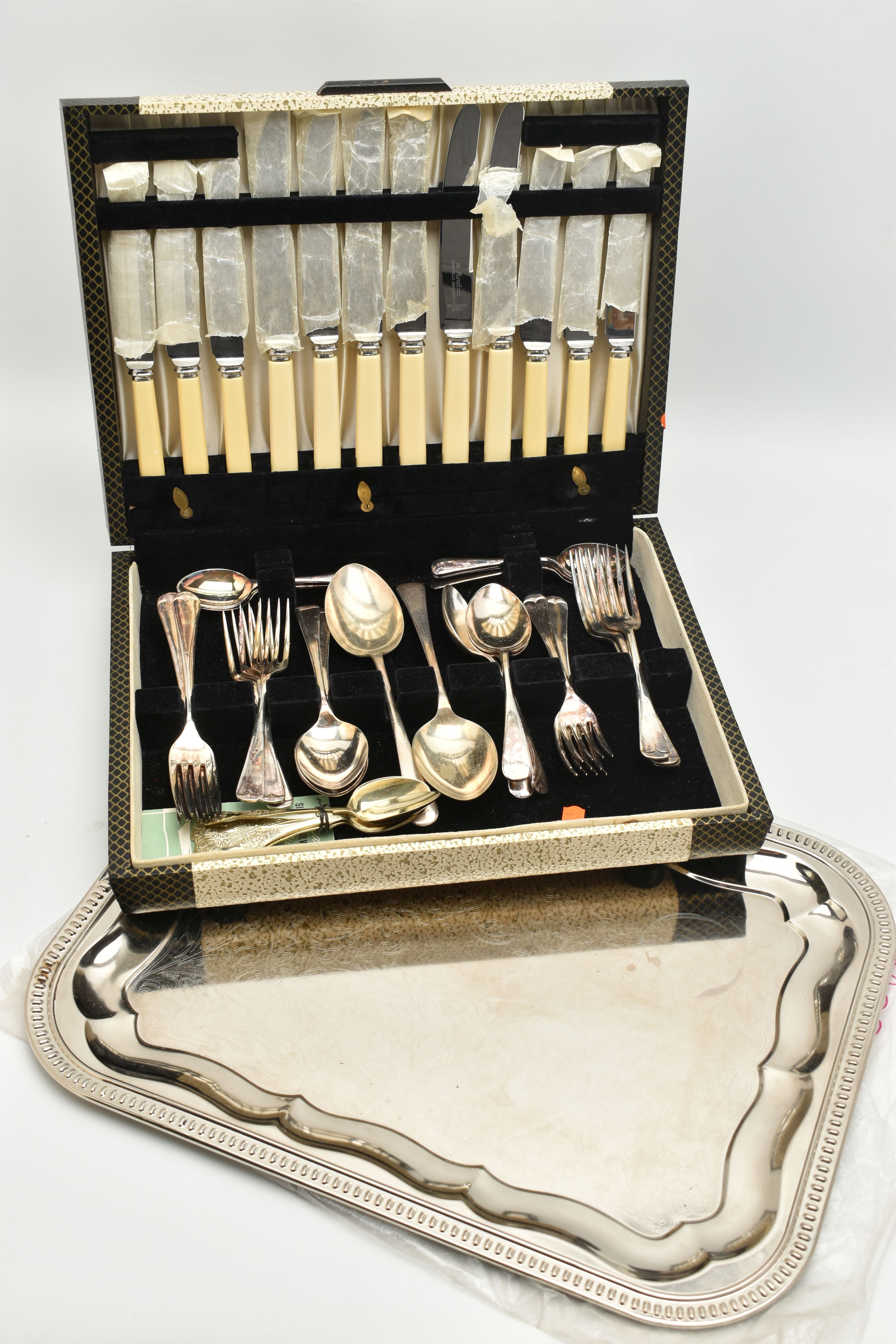 A CANTEEN OF CUTLERY AND A TRAY, a six person table setting, with a few extra cutlery items,
