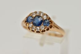 A LATE 19TH CENTURY DIAMOND AND SAPPHIRE RING, three oval mixed cut sapphires, prong set with a