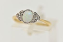 A YELLOW METAL OPAL AND DIAMOND RING, set with a central oval opal cabochon, flanked with single cut