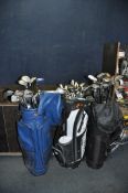 THREE GOLF BAGS CONTAINING TWENTY SEVEN IRONS, twenty one drivers and three putters from makers such