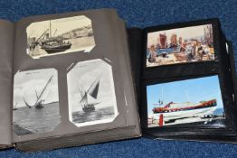 TWO ALBUMS OF POSTCARDS containing approximately 425 examples of liners, ships, boats, barges and