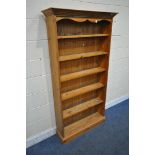 A MODERN PINE OPEN BOOKCASE, with five fixed shelves, width 97cm x depth 29cm x height 183cm (