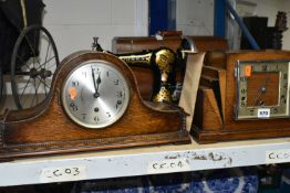 TWO CLOCKS AND A MANUAL SEWING MACHINE, comprising an Rugos oak cased Westminster chiming mantle