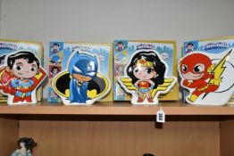 FOUR BOXED ENESCO 'DC SUPER FRIENDS' COIN BANKS, the ceramic money boxes comprising Wonder Woman,