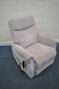 A CARE CO ELECTRIC RISE AND RECLINE ARMCHAIR (condition report: severely discoloured, in need of a