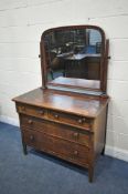 AN EARLY 20TH CENTURY MAHOGANY DRESSING CHEST, with a single swing mirror, two short above two