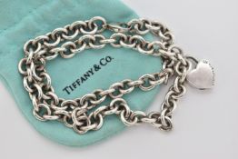 A SILVER 'RETURN TO TIFFANY' HEAVY NECKLACE, a heart lock pendant with red enamel detail 'Please