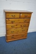 A MODERN PINE CHEST OF TWO SHORT OVER FOUR LONG DRAWERS, width 84cm x depth 40cm x height 107cm (