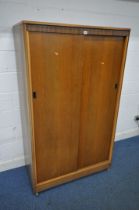 A MID CENTURY TEAK AUSTIN SUITE DOUBLE SLIDING DOOR WARDROBE, width 107cm x depth 58cm x height