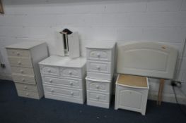 A SELECTION OF WHITE BEDROOM FURNITURE, to include a chest of two short over two long drawers, width