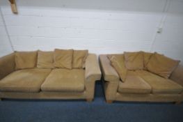 A BEIGE UPHOLSTERED TWO PIECE LOUNGE SUITE, comprising a three seater sofa, 214cm x depth 100cm x
