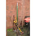 A SELECTION OF GARDEN TOOLS including pick axe, axe, sledgehammers, forks, spades, hoes etc