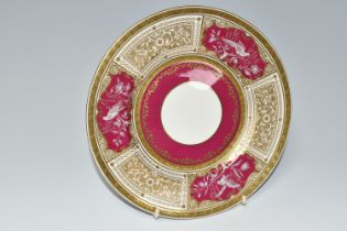 A MINTON PATE SUR PATE PLATE, DECORATED WITH THREE PANELS OF AN EXOTIC BIRD AMONGST FOLIAGE ON A