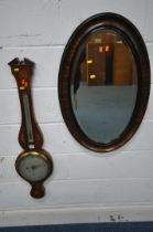 A 19TH CENTURY MAHOGANY AND SHELL INLAID BANJO BAROMETER, fitted with a thermometer, above a seven