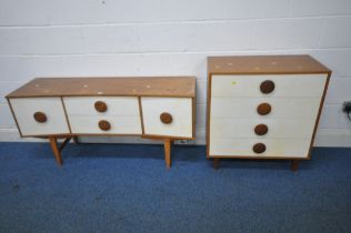 A MID CENTURY TEAK AND CREAM CONCAVE SIDEBOARD, with two drawers and two cupboard doors, width 138cm