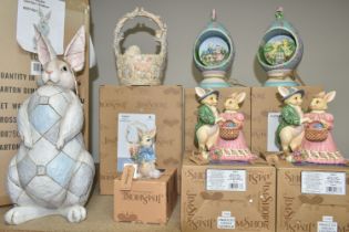 A GROUP OF BOXED ENESCO JIM SHORE EASTER FIGURES, comprising Grey Rabbit Garden Statue no 6001601,