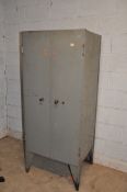 A VINTAGE METAL TWO DRAWER CABINET concealing 24 metal drawers, door has lock but no key width