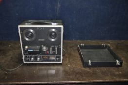 A VINTAGE AKAI 1721L REEL TO REEL RECORDER, 4 track Stereophonic with front cover (PAT pass,