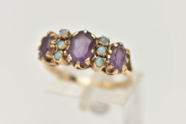 A 9CT GOLD AMETHYST AND OPAL RING, set with three oval cut amethysts each claw set, interspaced with