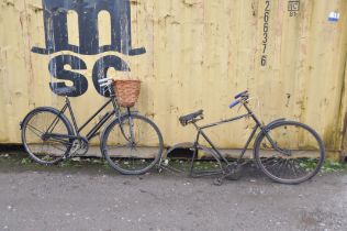 A VINTAGE RALEIGH LADIES SHOPPING BIKE with front basket, 21in frame and a Raleigh gents bike