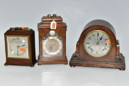 THREE WOODEN CASED MANTEL CLOCKS, comprising an Art Deco style Elliot clock retailed by Garrard &