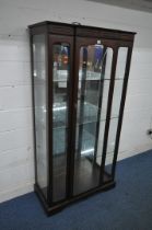 A MAHOGANY DISPLAY CABINET, with a single door that's enclosing three adjustable glass shelves,