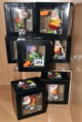 A GROUP OF INDIVIDUALLY BOXED DISNEY SHOWCASE COLLECTION BRITTO MINI FIGURES, comprising Snow