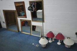 A SELECTION OF MIRRORS AND LAMPS, to include a gilt framed bevelled edge wall mirror, 112cm x