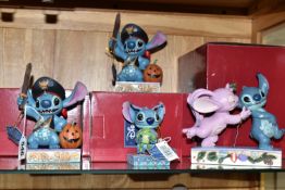 FOUR BOXED DISNEY SHOWCASE COLLECTION FIGURINES, designed by Jim Shore, comprising two 'Lovable
