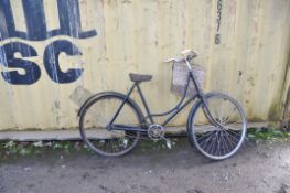 A VINTAGE DUNELT LADIES SHOPPING BIKE with distressed front basket, 22in frame
