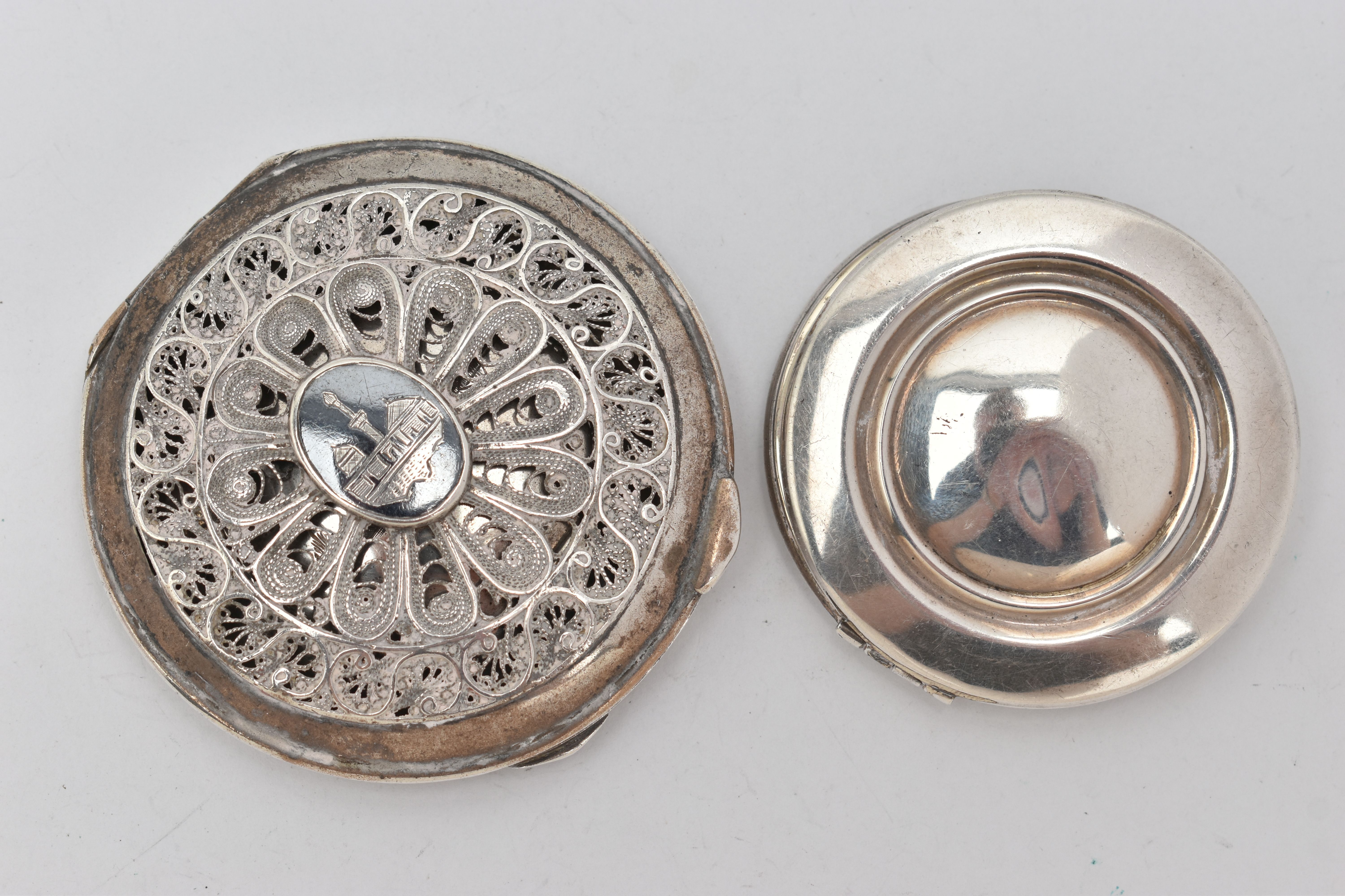 TWO COMPACTS, to include a silver 'Kigu' round polished compact, hallmarked 'Kigu Ltd' Birmingham