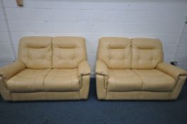 A PAIR OF CREAM TWO SEATER SOFAS, length 153cm x depth 100cm x height 100cm, along with a matching