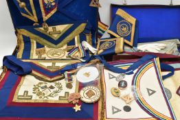 A SELECTION OF MASONIC REGALIA AND JEWELS, to include six aprons, four collars, a pair of cuffs,