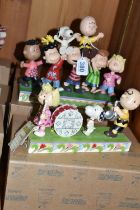 TWO BOXED ENESCO 'PEANUTS' FIGURE GROUPS, designed by Jim Shore, comprising 'A Playful Parade' no