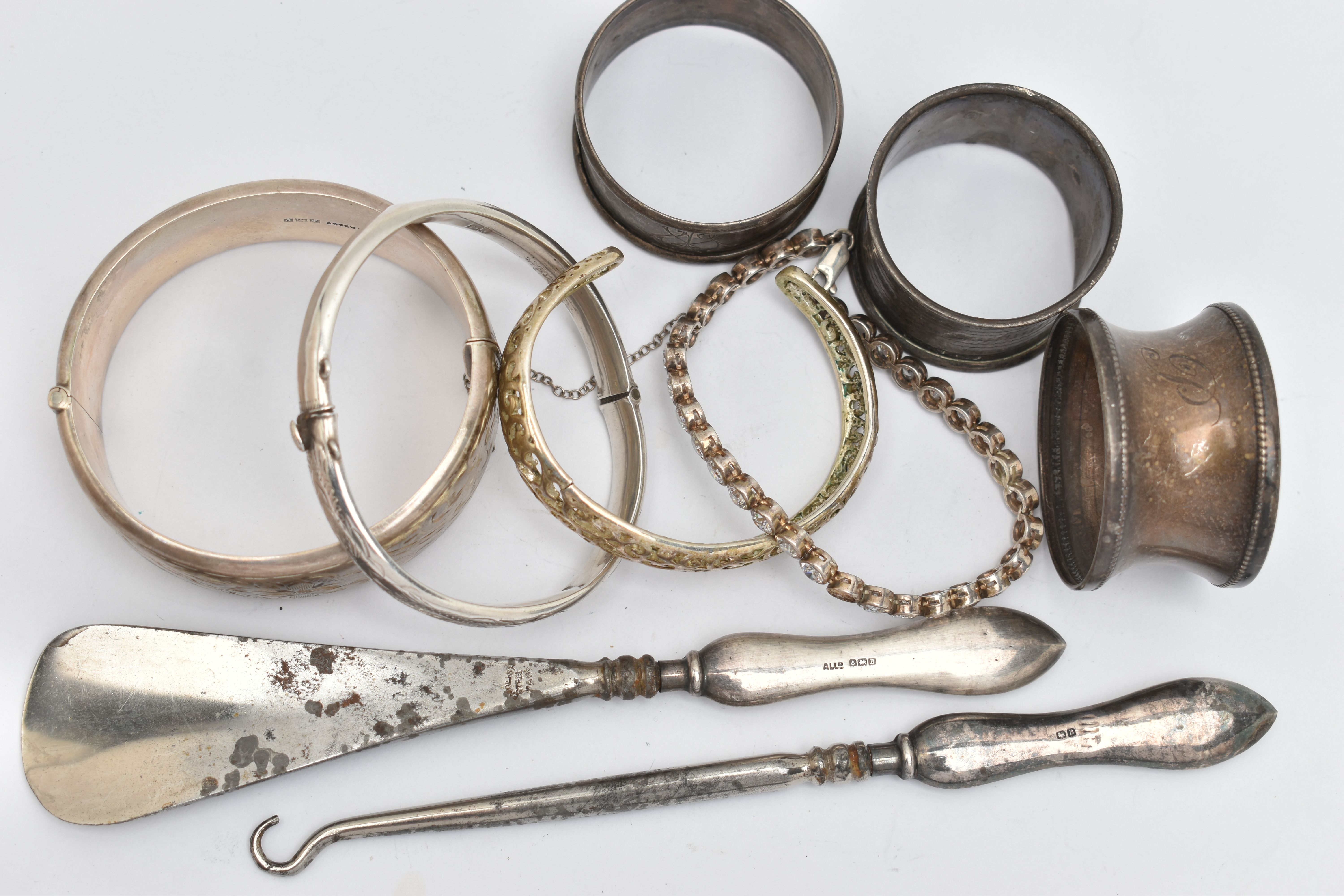 SILVER BANGLES, NAPKIN RINGS AND OTHER ITEMS, to include a silver wide hinged floral bangle, push - Image 2 of 4