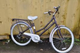 A PENDLETON BLOSSOMBY LADIES BIKE in purple with 6 speed twist grip gears, 15in frame