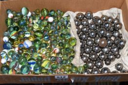 A BOX OF VINTAGE GLASS MARBLES AND STEEL BALLS, assorted sizes