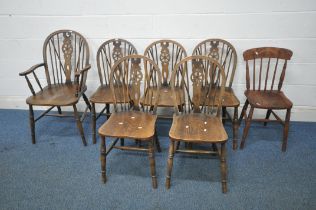 A SET OF SIX ELM SEATED WHEEL BACK CHAIRS, including one carver, along with another chair (condition
