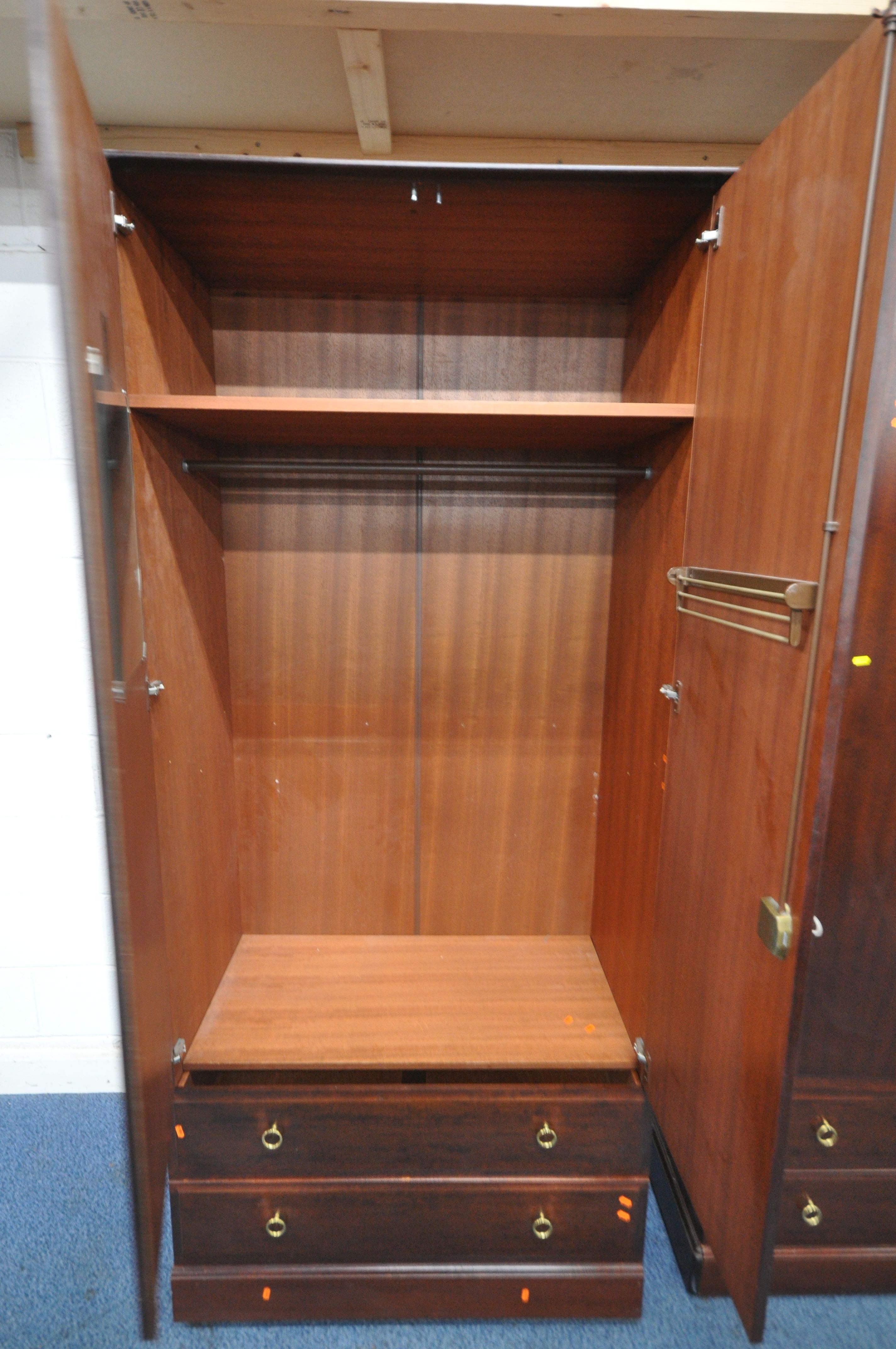 A PAIR OF TALL STAG MINSTREL DOUBLE DOOR WARDROBES, each with two drawers, width 104cm x depth - Image 3 of 4