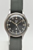 A SMITHS BRITISH MILITARY WRISTWATCH, the matt black dial, with Military arrow, circled T, white