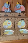 A GROUP OF BOXED ENESCO DUMBO PLAQUES AND MONEY BANKS, from Disney Enchanting Collection, comprising