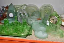 A GROUP OF DECORATIVE GLASS WARE, to include uranium glass dressing table items, including a figural