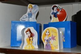 FOUR BOXED ENESCO 'DISNEY ENCHANTING COLLECTION' CERAMIC MONEY BOXES, comprising 'Some Day My Prince