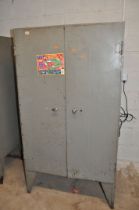 A VINTAGE METAL TWO DRAWER CABINET concealing 31 metal drawers (one missing), door has lock but no