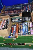 FIVE BOXES OF DVDS, CDS AND VHS TAPES, containing over 200 DVDs, over thirty VHS video tapes and
