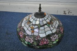 A TIFFANY STYLE LAMP SHADE, depicting flowers, foliage and dragonflies, diameter 50cm (condition